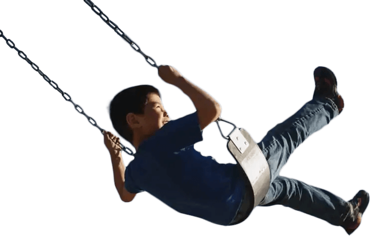 Young boy swinging